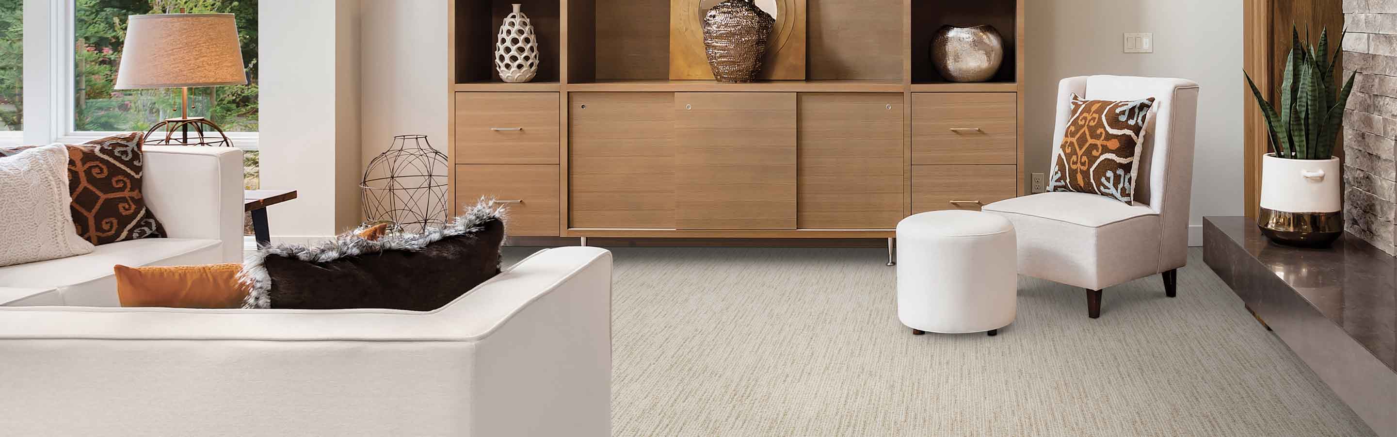 Neutral Berber carpet with cream furnishings. 